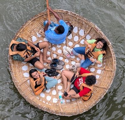 An aerial view of a coracle ride at Hogenakkal Falls. This is one of the most exciting activities on our one-day trip.