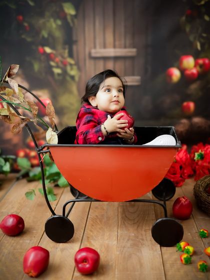 A thoughtful moment in the apple cart. Even quiet moments are beautiful in these creative, themed sessions.