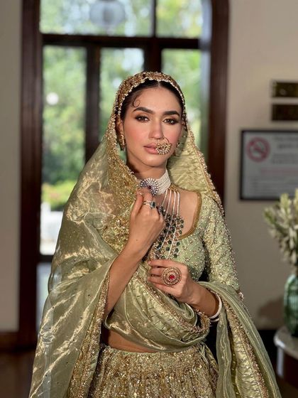 The full view of the masterclass bridal look, demonstrating how to style a complete, cohesive, and traditional ensemble.