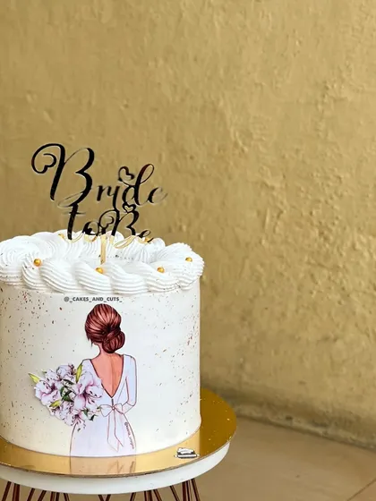 A close-up of the "Bride to be" cake, showing the delicate details and light speckling effect.