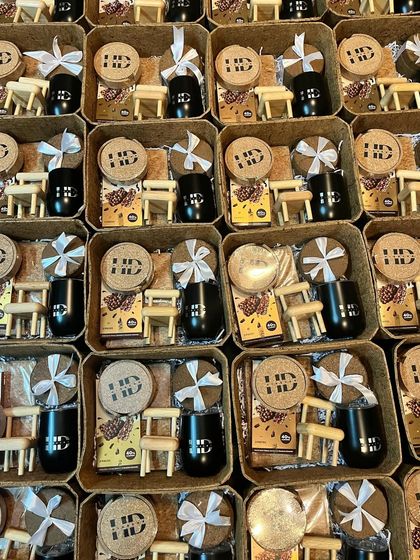 Here is a look at a bulk order of employee welcome kits. Each kit is packed in a plantable coconut fibre box and includes a branded mug and cork coasters, making a great first impression on new team members.