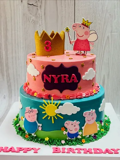 An oink-tastic celebration for Nyra's 3rd birthday! This two-tier Peppa Pig cake is bright, cheerful, and perfect for bringing smiles to little faces.
