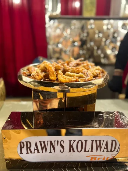 A serving dish of Prawns Koliwada, another one of my signature seafood appetizers, ready for the buffet.