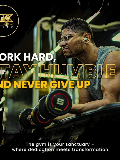 Work hard, stay humble, and never give up. A member performs a concentration curl, an exercise that requires focus and control to build bicep definition. The gym is where dedication meets transformation.