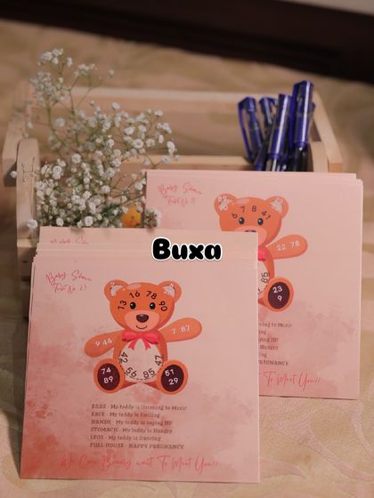 The fun "Guess the Baby's Gender" game cards I designed for a teddy bear themed baby shower.