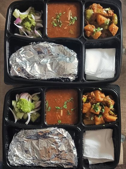 A classic homestyle meal of aloo capsicum sabzi and a simple dal. This is the perfect light and healthy tiffin for your daily office lunch.