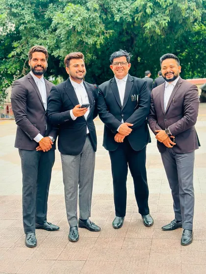 Sharing a moment with my team outside the court building.