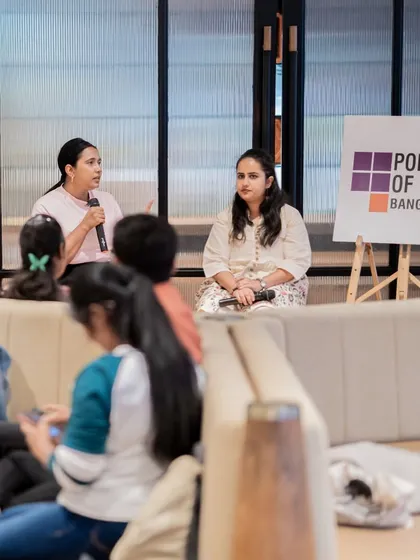 The audience, including young children, listens to the health awareness session. We aim to create events that are valuable for the entire community.