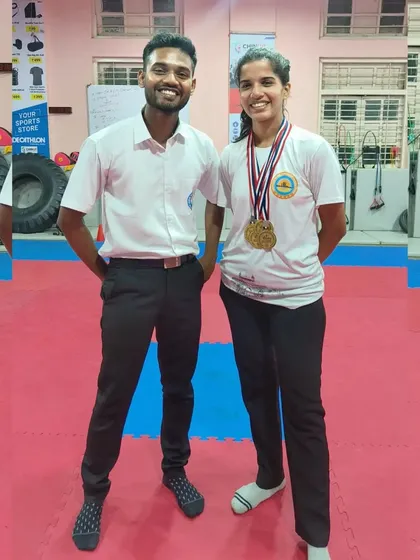 A moment of shared success between a coach and a champion. Our coaching staff provides the guidance and support necessary for our athletes to reach their full potential inside and outside the ring.