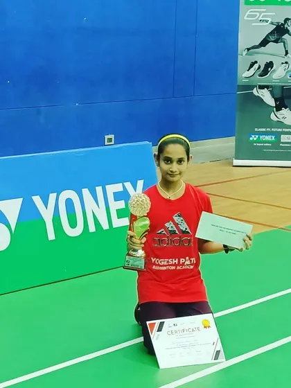 Aditi Yadav with her first prize trophy at the Palava Sub-Junior Maharashtra State Badminton Tournament 2023.