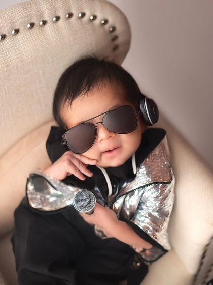 Introducing the coolest DJ in town. This fun and playful setup shows that we can get creative with modern and humorous themes for your baby's photoshoot.