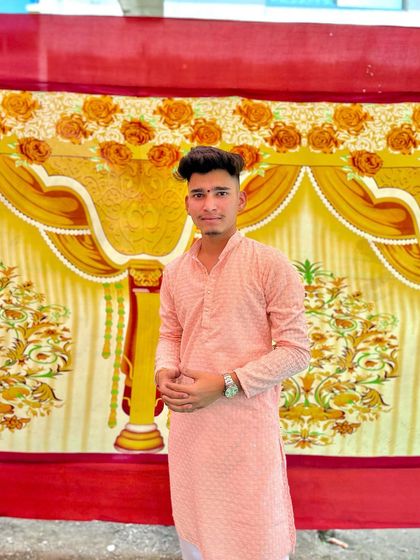 Another shot of the happy client in his custom-designed pink kurta. A well-fitted kurta can make all the difference in feeling confident and comfortable.