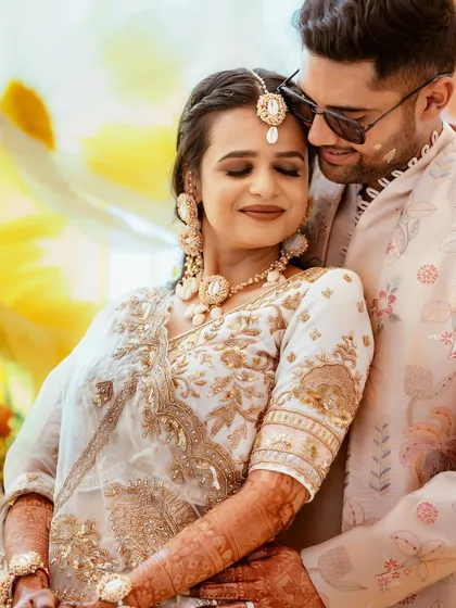 An intimate moment between the couple, their happiness radiating.