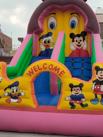 Another one of our popular Mickey Mouse and friends designs. This one is a bit more compact, with a single slide, making it great for smaller spaces or younger children's parties.