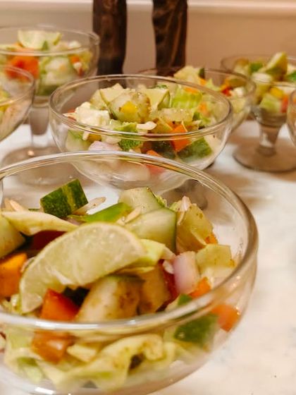 Fresh and crisp Kachumber salad served in elegant cocktail glasses. This is a refreshing and healthy starter or side dish for any Indian meal.