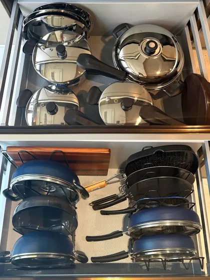 No more noisy, cluttered pot drawers. We use smart vertical stacking solutions to protect your cookware and make every pot, pan, and lid easy to grab, transforming a daily frustration into a moment of ease.