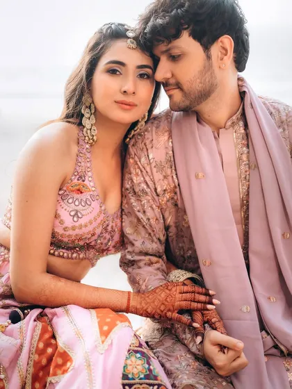 A tender portrait of Rupanshi and Yash. The way they are looking at the camera feels personal and engaging, drawing the viewer into their story.