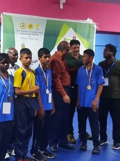 Our team with officials, celebrating a successful competition. These events are important for building experience and team morale.