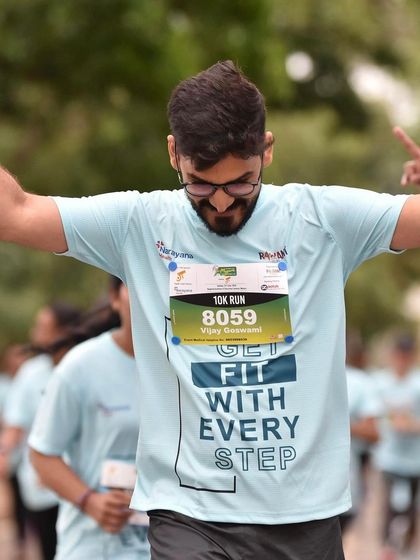 A duplicate of image 20. So proud of my husband finishing his 10k at the Mysuru race after a six-year break. Running is a journey we can share, and his achievement meant the world to me.