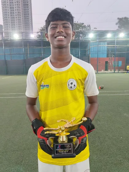 Kayden Vaz proudly displays his award for Best Emerging Player. We are excited to see him continue to grow and develop his skills.