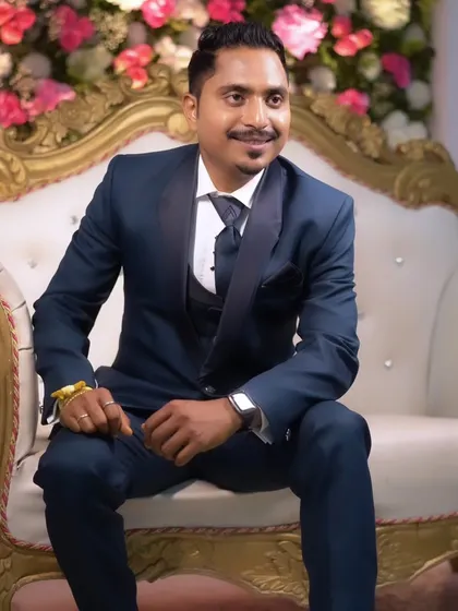 A classic portrait of the groom on the wedding stage, looking confident and ready for his new beginning.