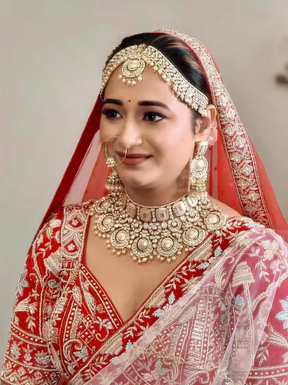A vision of love and elegance. This bride's look is a masterpiece of my own vision, from the intricate jewelry I provided to the flawless makeup and hair.