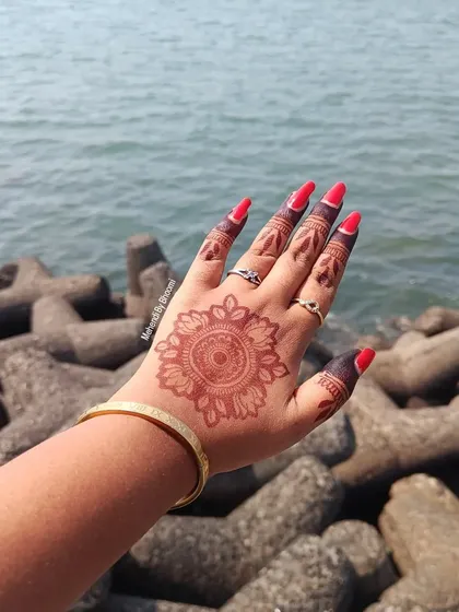 A simple mandala design is perfect for festivals like Diwali. It's festive and beautiful but doesn't take too long to apply, giving you more time to celebrate.