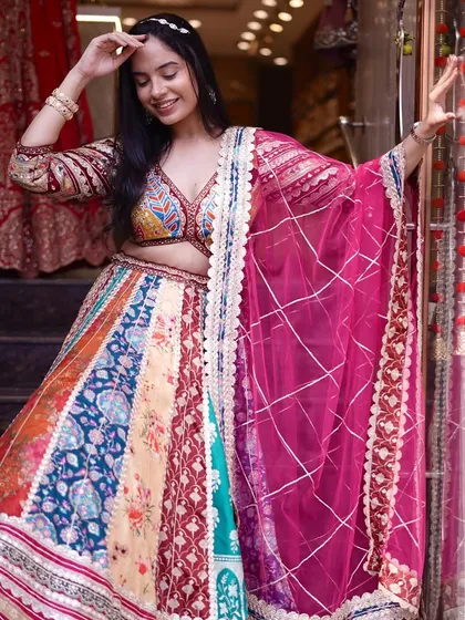 Wearing art, wearing tradition. This multicolored lehenga is a masterpiece of timeless beauty, perfect for any festive celebration.