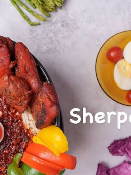 A closer look at the toppings on our Sherpa Rice, including the boiled eggs, red gravy, and tender chicken pieces.