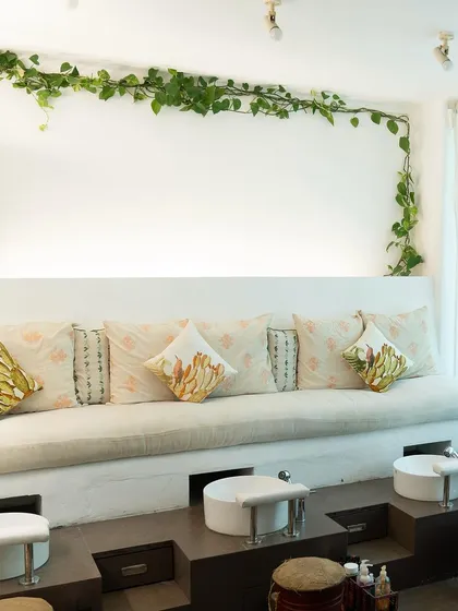 Welcome to your self-care sanctuary. Our pedicure station is designed for comfort and tranquility, surrounded by calming greenery. Here, you can unwind and let us take care of the rest.