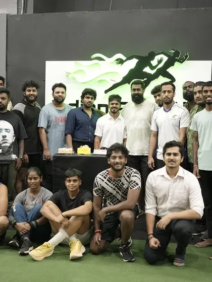 This is our tribe. A candid moment with our athletes and coaches celebrating together at our gym. We are more than just a training center; we are a community that supports each other through the daily grind and celebrates every victory, big or small.