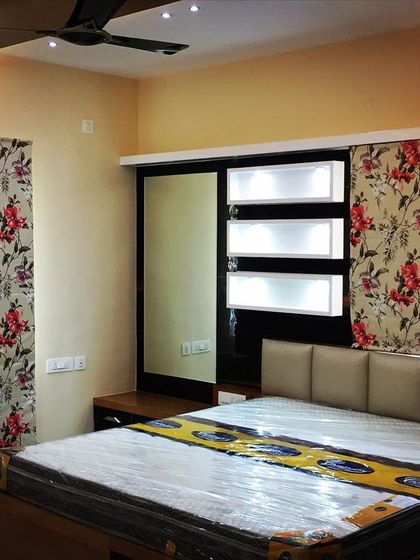 A duplicate of the Bangalore flat bedroom, showing the cohesive use of the floral pattern.