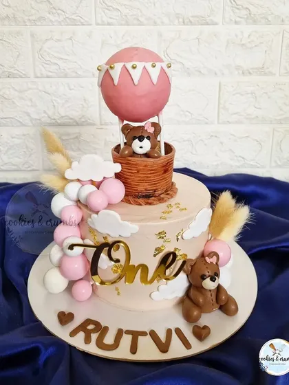 This is one of my favorite designs ever. A cute teddy bear in a hot air balloon, made for a first birthday. I love crafting these detailed fondant figures and balloon elements to make a celebration truly memorable.