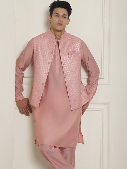 A full view of the pink kurta jacket set, showing its modern fit and color. It's a versatile outfit for any festive occasion.