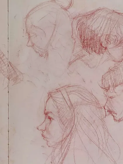 A page of delicate, classical-style portrait sketches in red pencil, capturing the faces of the festival.