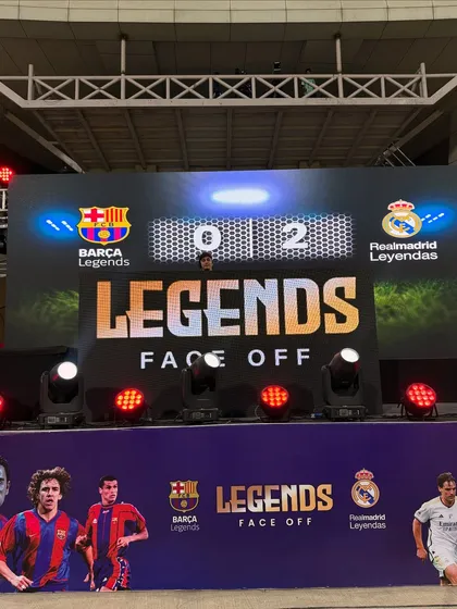 Peeking over the console at "The Sports Legends Face Off" event. Seeing the final score on the big screen while being the official DJ was an unreal experience.