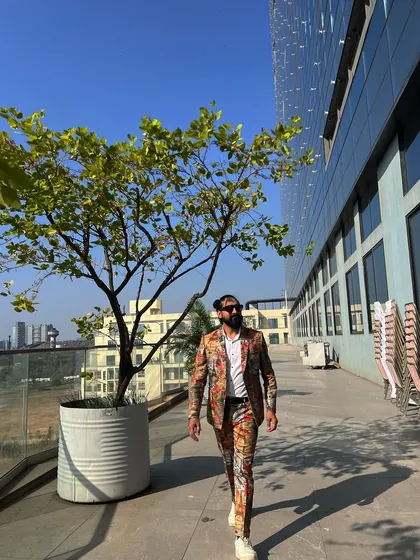 It's Carnival Day! Dressed in a custom printed suit, I'm ready to bring the energy and style to a fun, themed day party.