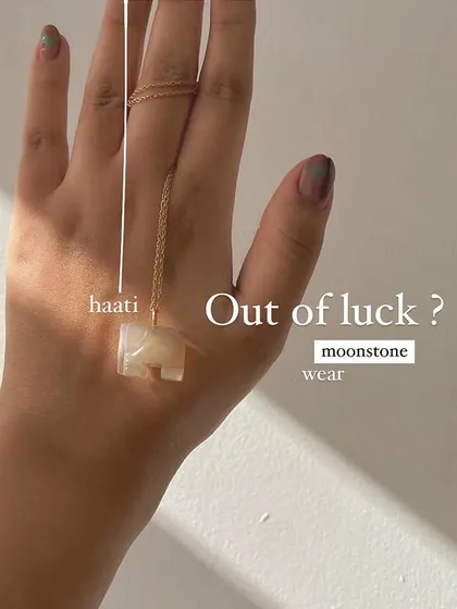 Out of luck? My grey moonstone 'haati' pendant, worn here on the hand, is a powerful charm for manifesting good fortune and abundance.