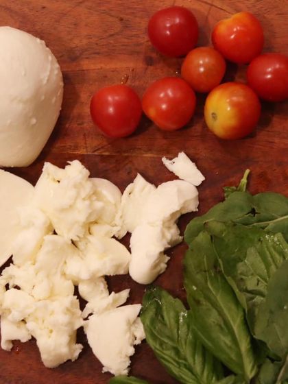 The foundation of great pizza is great ingredients. Here you can see the fresh mozzarella, cherry tomatoes, and basil I use to craft my authentic Neapolitan pizzas.