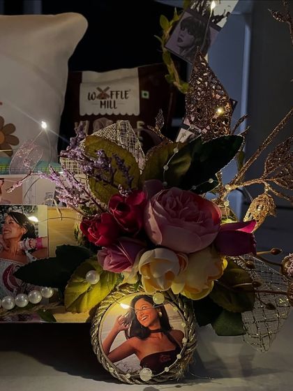 A detailed shot of the custom photo frame on the side of the Taylor Swift cart hamper, showing how every part of the gift is personalized.