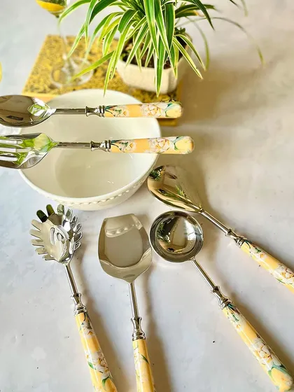 This cutlery set from our Lisbon Lemon collection features beautifully printed handles. The set includes serving spoons, forks, and specialty servers to cover all your dining needs in style.