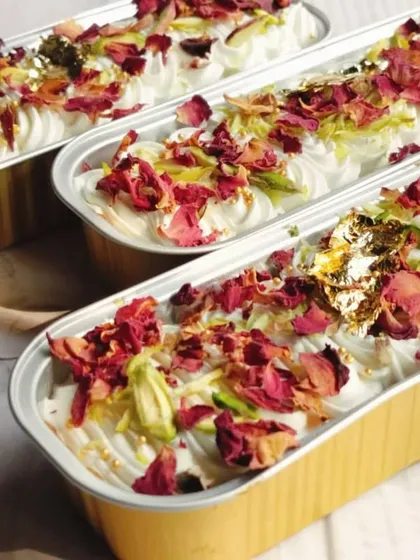 To celebrate Eid, I prepare these stunning Rose and Pistachio Tres Leches Boats. They are decorated with delicate rose petals, crunchy pistachios, and edible gold for a truly special treat.