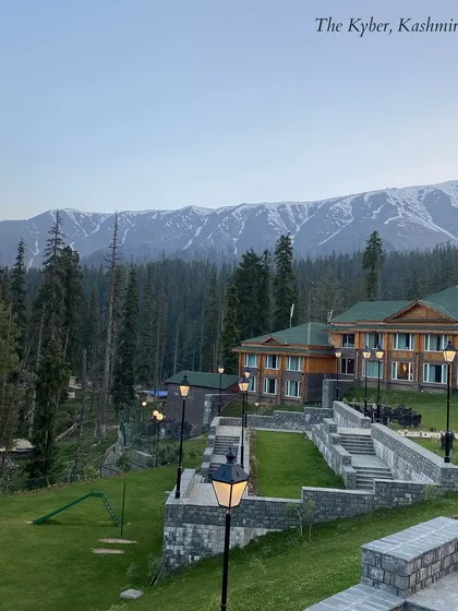The Khyber Himalayan Resort & Spa in Kashmir, surrounded by snow-capped mountains. This is a breathtaking choice for a unique and cozy winter destination wedding.