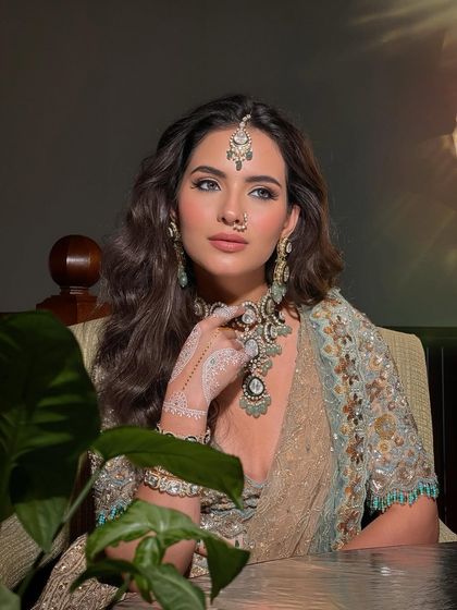 Another angle of the Maharani look, showcasing the stunning jewellery and the flawless makeup that enhances her regal presence.