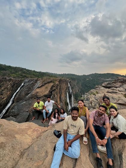 Our group relaxing at the Jog Falls viewpoint, enjoying the majestic scenery.