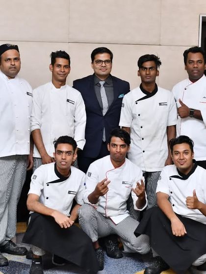 Our General Manager with members of the kitchen team. We are proud of the talented chefs who pour their passion into every meal.