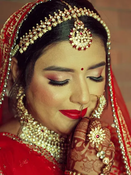 A quiet moment of bridal beauty. For this getting ready shoot, I focused on the intricate details of the makeup and jewelry, capturing the bride's serene expression just before the wedding ceremony.