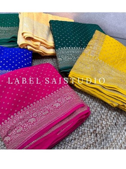 A collection of our pure Banarasi crepe silk sarees in traditional colors and designs. These single-shade sarees come with rich brocade blouses, making them perfect for the festival season.