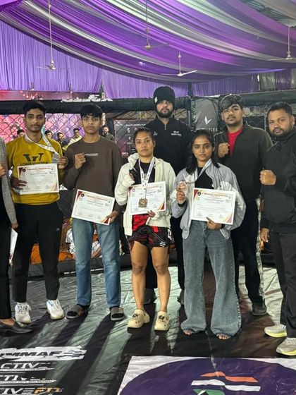 Team FC Club celebrating with their medals after the 8th MMA India National Championship in Madhya Pradesh.