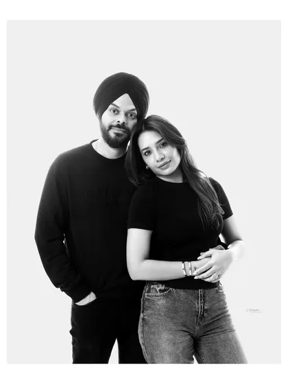A classic black and white portrait of a couple, comfortable and connected. Sometimes the simplest shots are the most powerful.